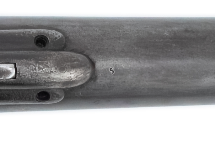 The matching number 5 stamped beneath the barrel.