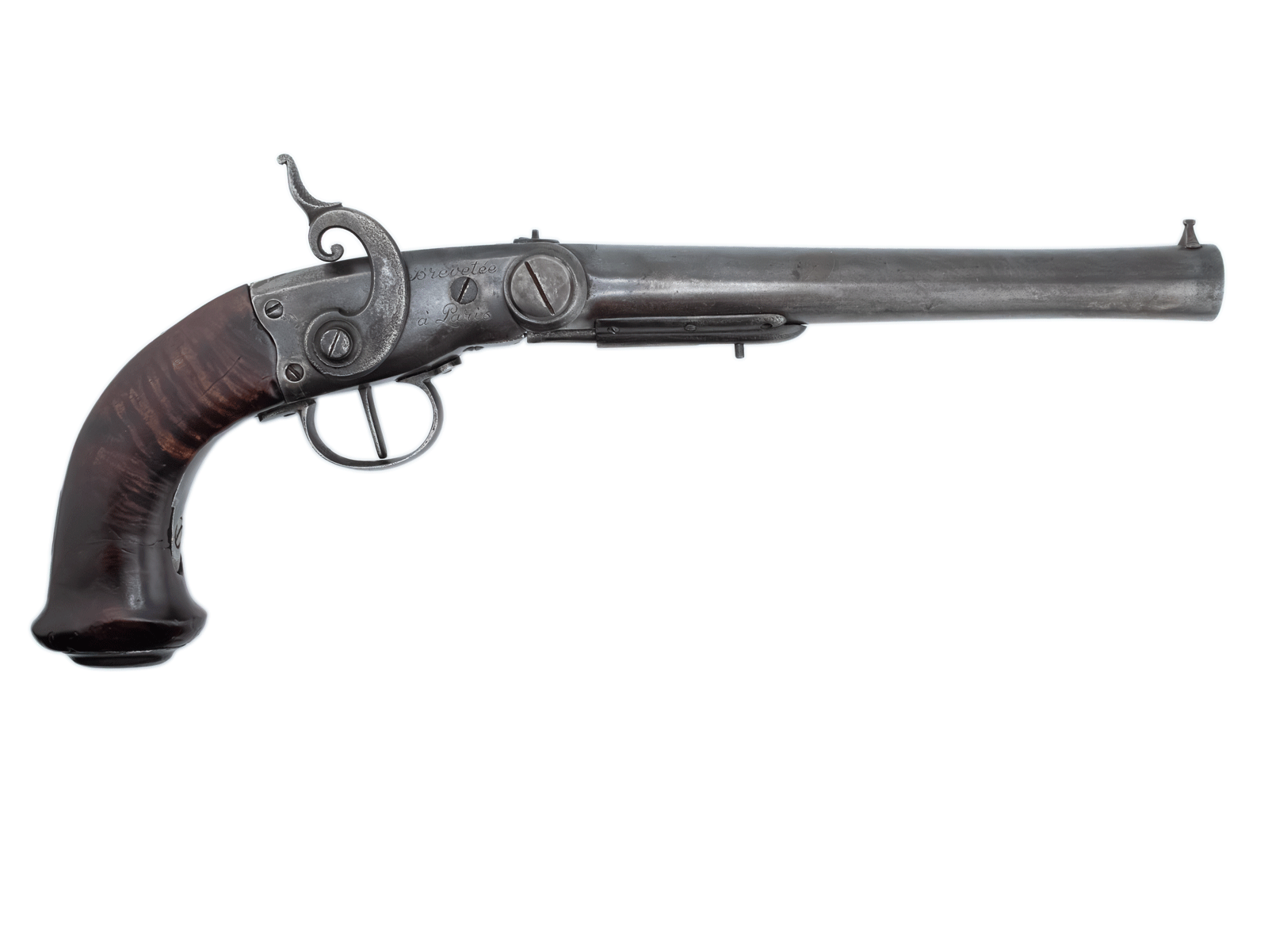 Opening the barrel exposes the rear of the chamber. A complete primed cartridge was inserted at the breech before the barrel was raised and secured for firing.