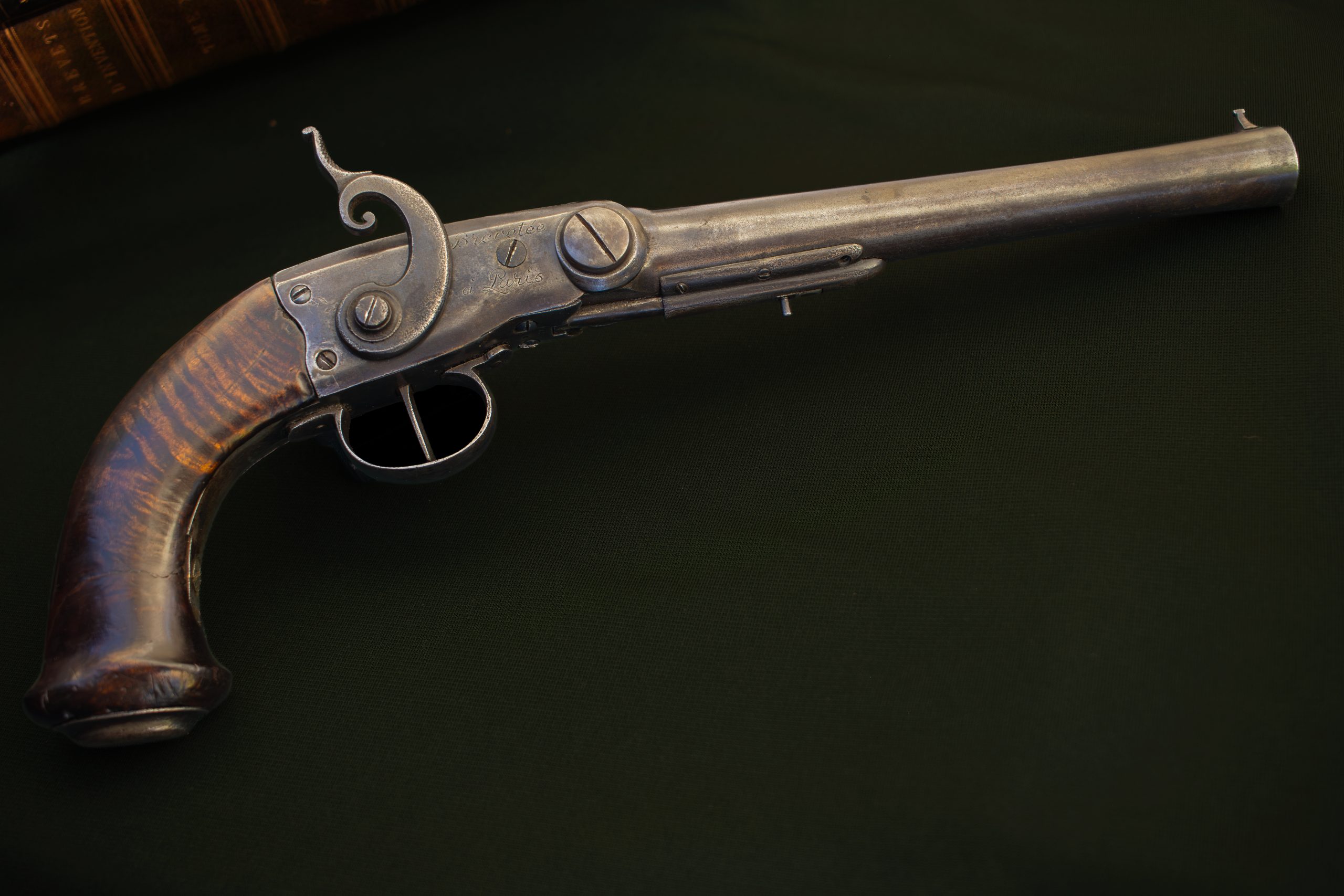Pauly breechloading pistol No. 5, internally dated 1813. Its barrel pivots downward for loading and is secured by an unusual longitudinal lock beneath the barrel.