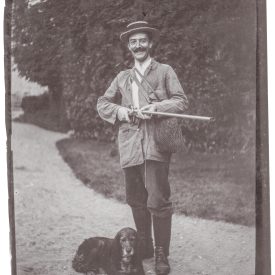 A Toast to the Chase: The Spirited Hunter and His Loyal Hound