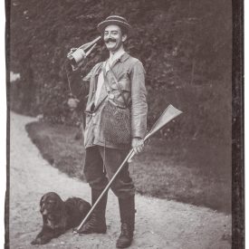 A Toast to the Chase: The Spirited Hunter and His Loyal Hound