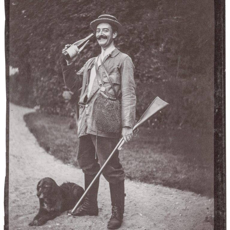 A Toast to the Chase: The Spirited Hunter and His Loyal Hound